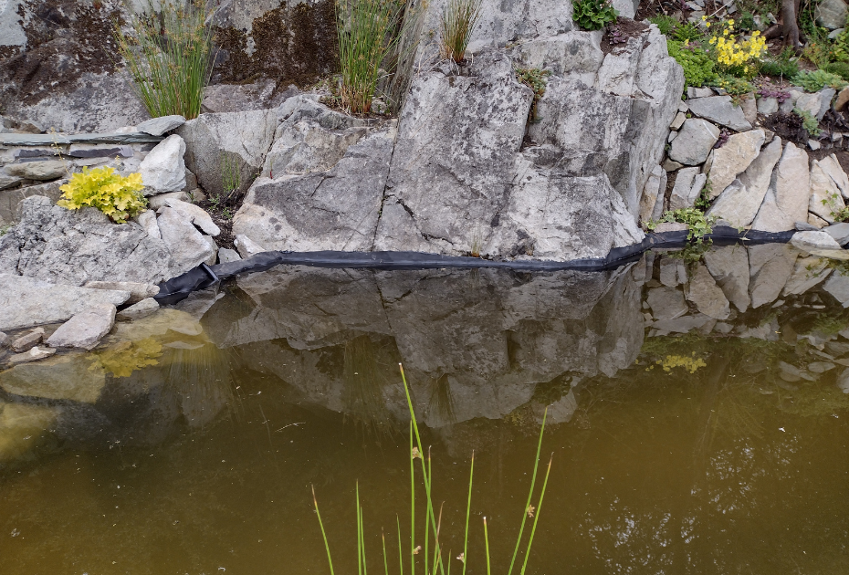 Aim was to minimise visibility of pond liner above water level